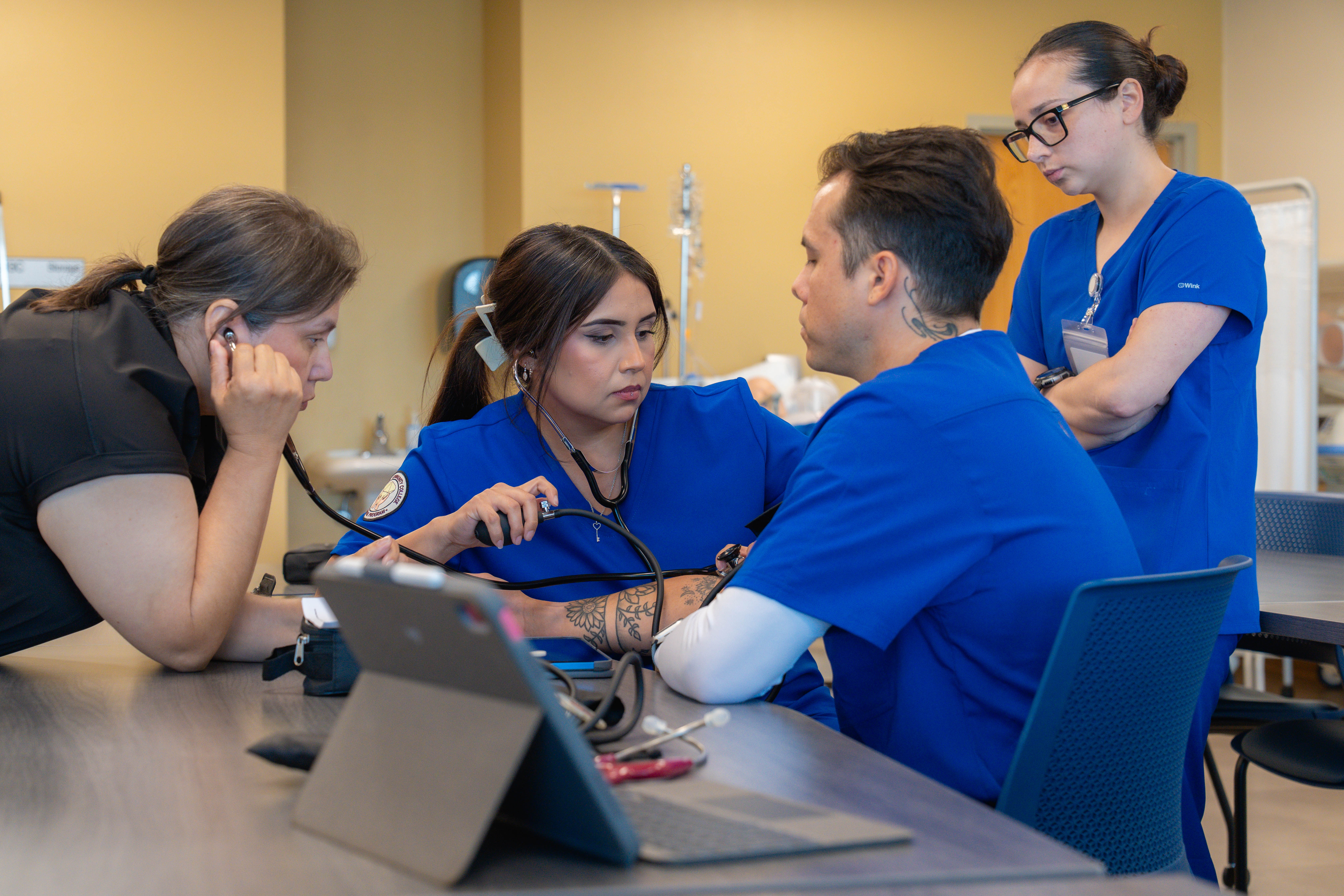 Nurses practicing on eachother
